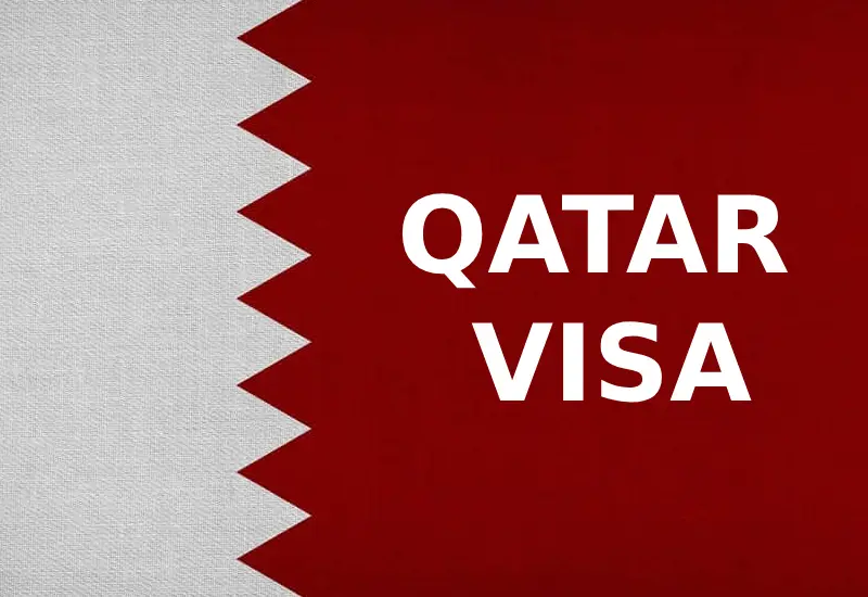 A close-up of an official Qatar visa marked as approved, indicating permission for entry into the country.